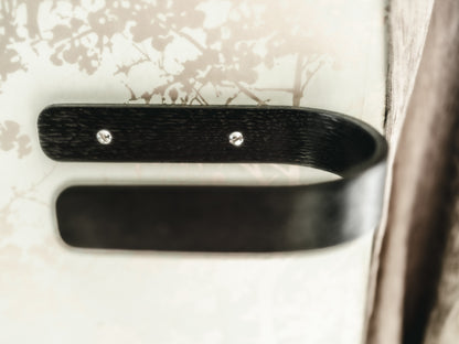Luxury designer curtain holdbacks tie backs made from solid oak by noir.design